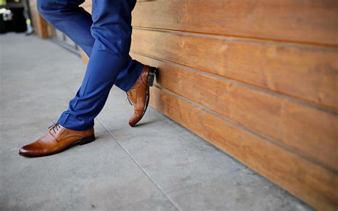 blue jeans with brown shoes.